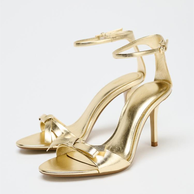 Elegant Golden Bow Brand High  - Metallic Heel Sandal ulasan dan harga