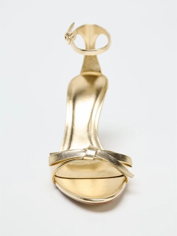 Elegant Golden Bow Brand High  - Metallic Heel Sandal ulasan dan harga